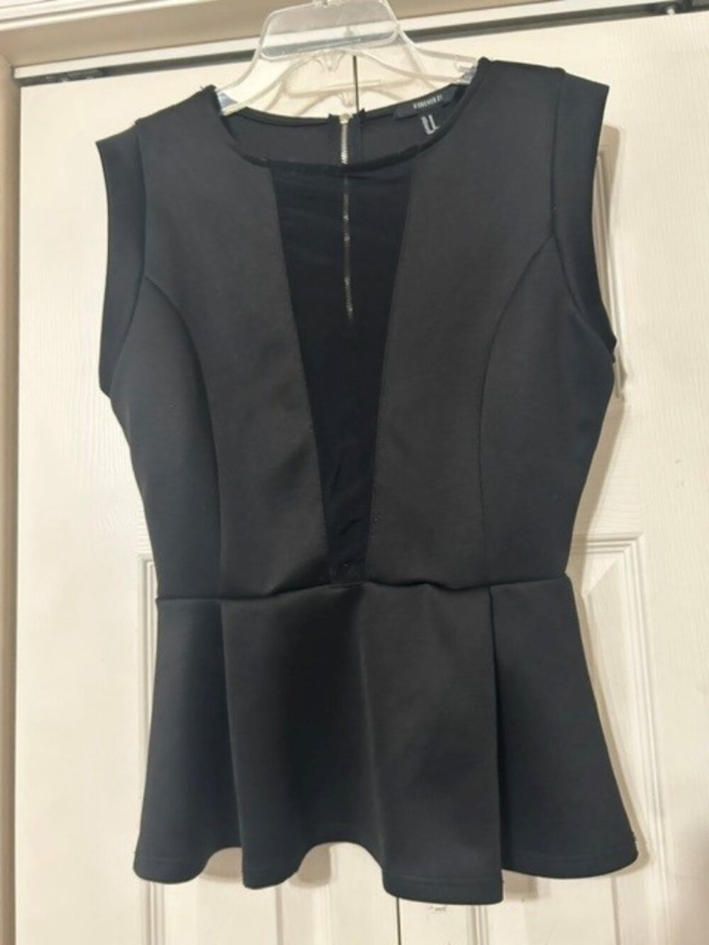 Black Short Sleeveless Mesh peplum top with a silver zipper on the back (M)
